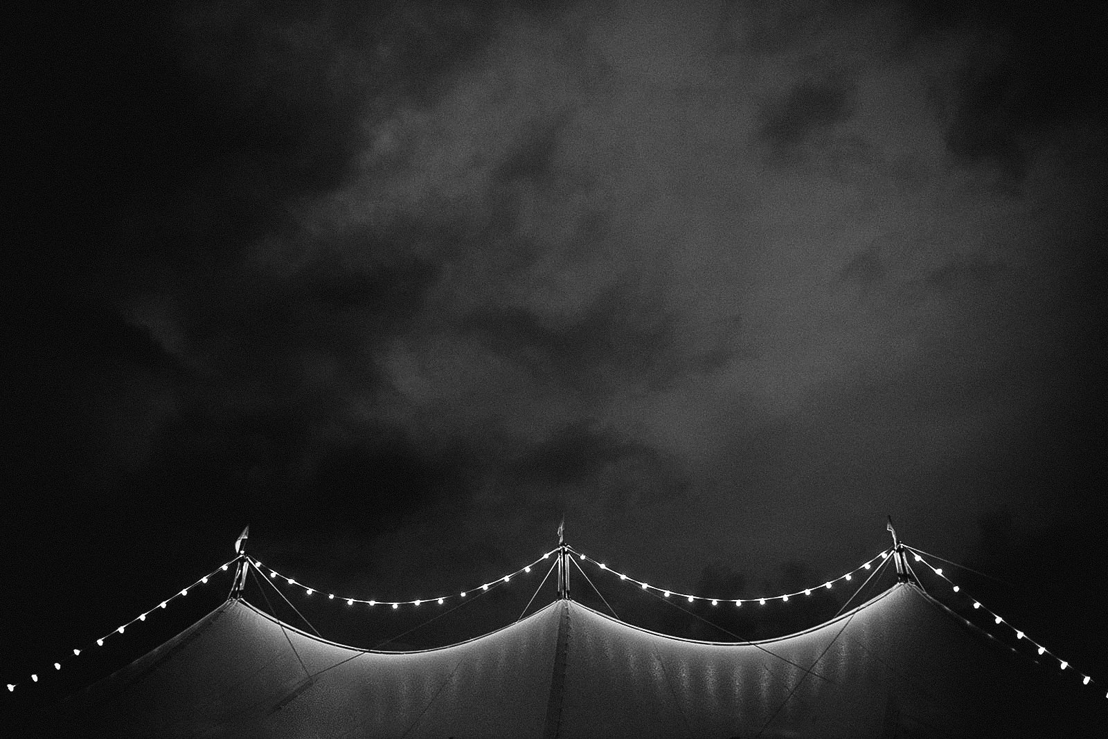 the tent of a wedding in the lake district in black and white