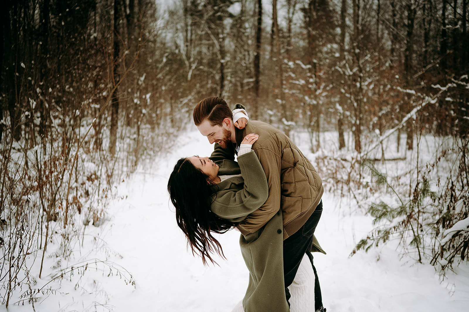 pre wedding shoot at mai & Micheal at Foxglove farm and Forest.in the winter with snow