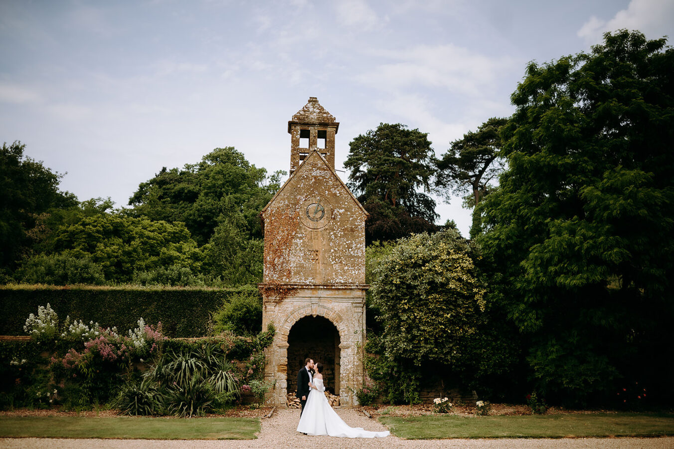 Bride and groom sharing a kiss at Brympton house in Somerset